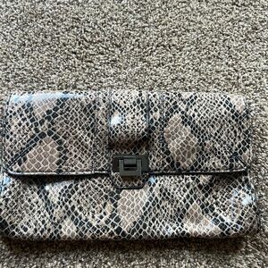 Snake print Jessica Simpson clutch bag